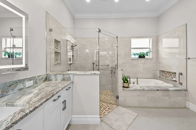Beautiful bathroom remodel in Delray Beach FL that has different bathroom tile types in it