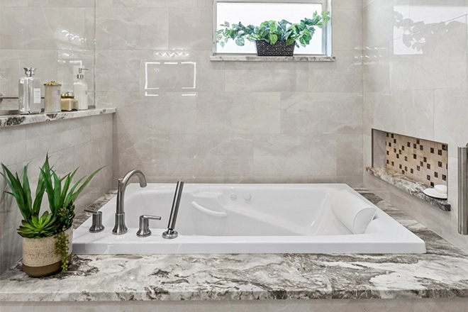 Beautiful built-in bathtub representing freestanding bathtubs vs built in bathtubs