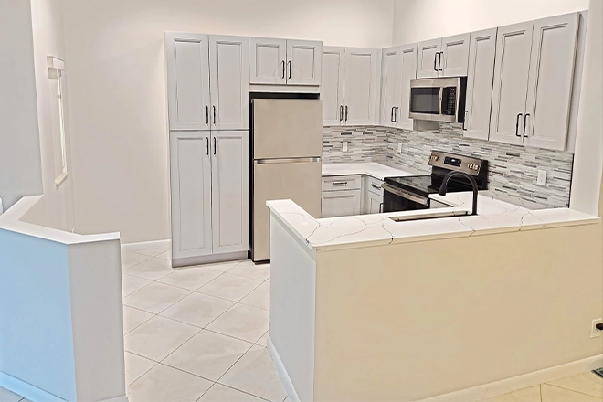 Beautiful small white kitchen after remodel