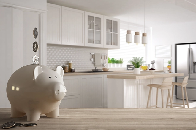 How to save money on a kitchen remodel represented by piggy bank in kitchen