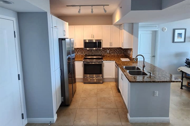 New kitchen with floor representing the kitchen flooring cost in Delray Beach