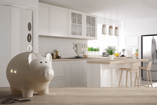 Piggy bank getting money in kitchen
